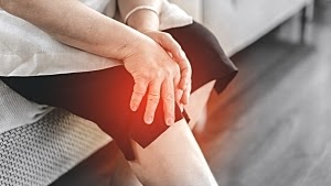 Old people stay alone at home has injury concept. Asian elderly woman has knee osteoarthritis pain.; Shutterstock ID 2151857505; other: ; purchase_order: 123; client: ; job: